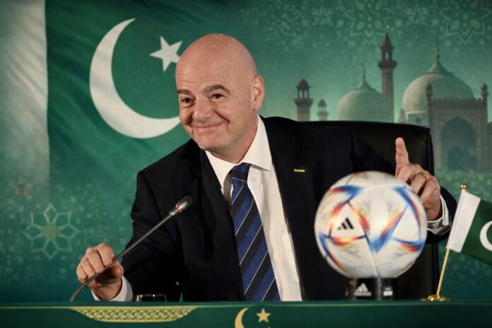 FIFA President Gianni Infantino speaking during an international forum with Pakistan backdrop