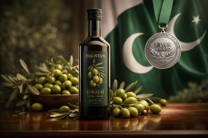 Bottle of Loralai extra virgin olive oil with silver award medal and Pakistan flag