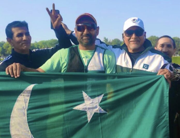 Pakistani shooter Colonel Farrukh Nadeem celebrates gold medal win at Asian Shotgun Championship in Doha