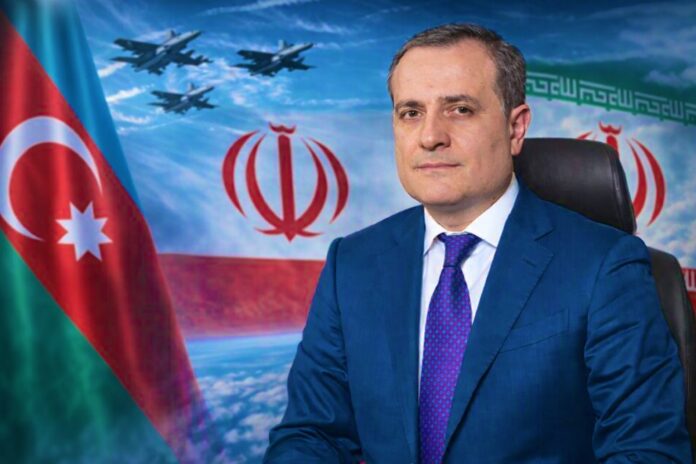 Azerbaijan Foreign Minister Jeyhun Bayramov with national flags amid regional tensions