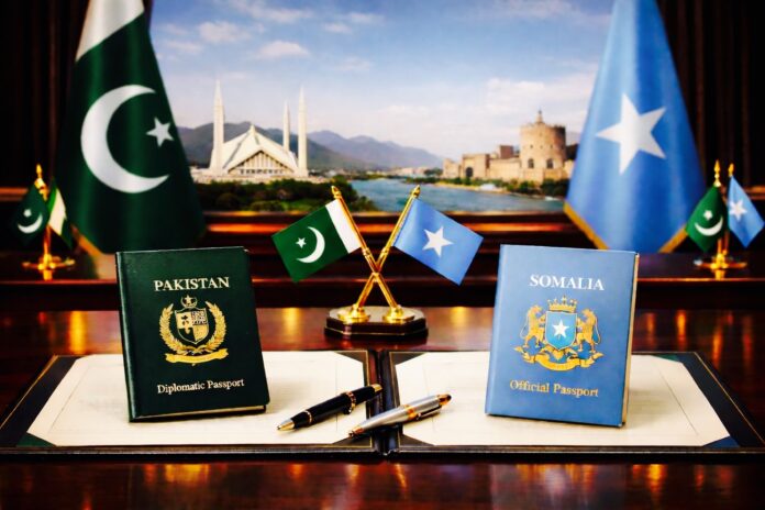 Pakistan and Somalia diplomatic passports displayed during visa-free agreement signing in Islamabad