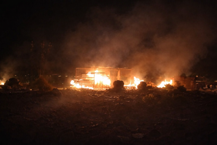 Night scene showing fire after reported cross border strike targeting militant positions