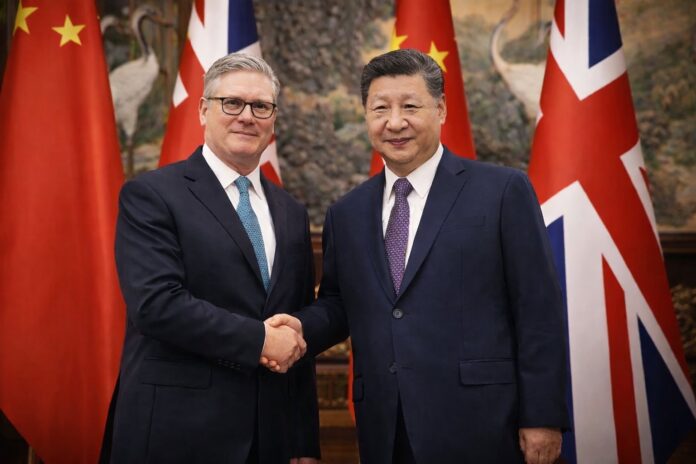 Keir Starmer shakes hands with Xi Jinping during UK China diplomatic talks in Beijing